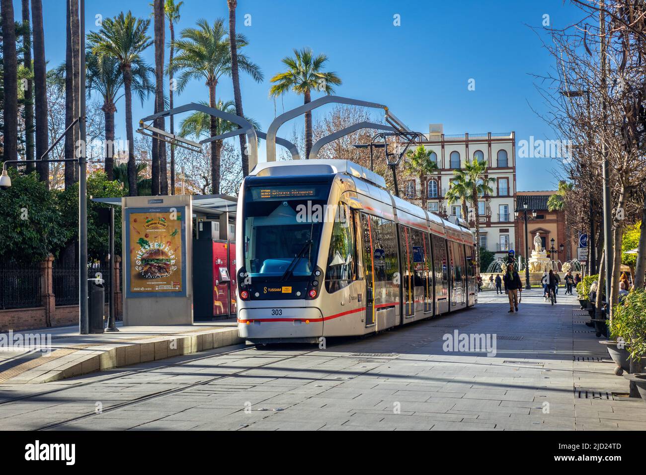 MetroCentro Tram At Plaza Nueva Using A Rapid Battery Charger Called Acumulador de Carga Rápida (ACR), Seville Spain Spanish Tram Streetcar Sevilla Stock Photo