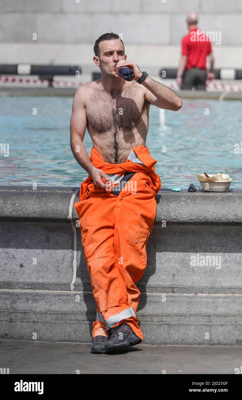 Tom Akers in Trafalgar Square, London . A sweltering 34C (93.2F) is  expected in London and potentially some spots in East Anglia on Friday,  according to the Met Office. Picture date: Friday