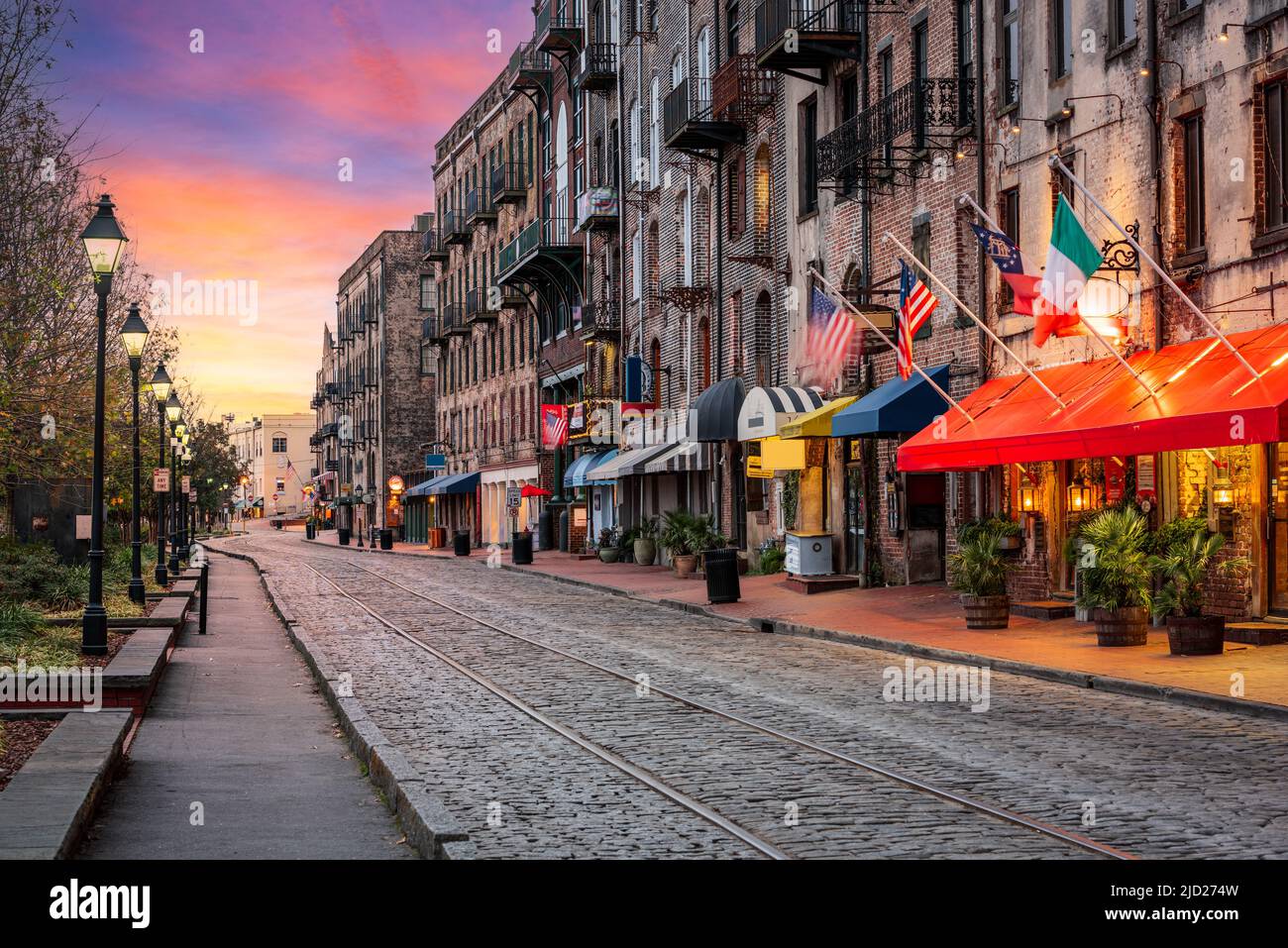 Savannah, Georgia, USA bars and restaurants on River Street at dawn. Stock Photo