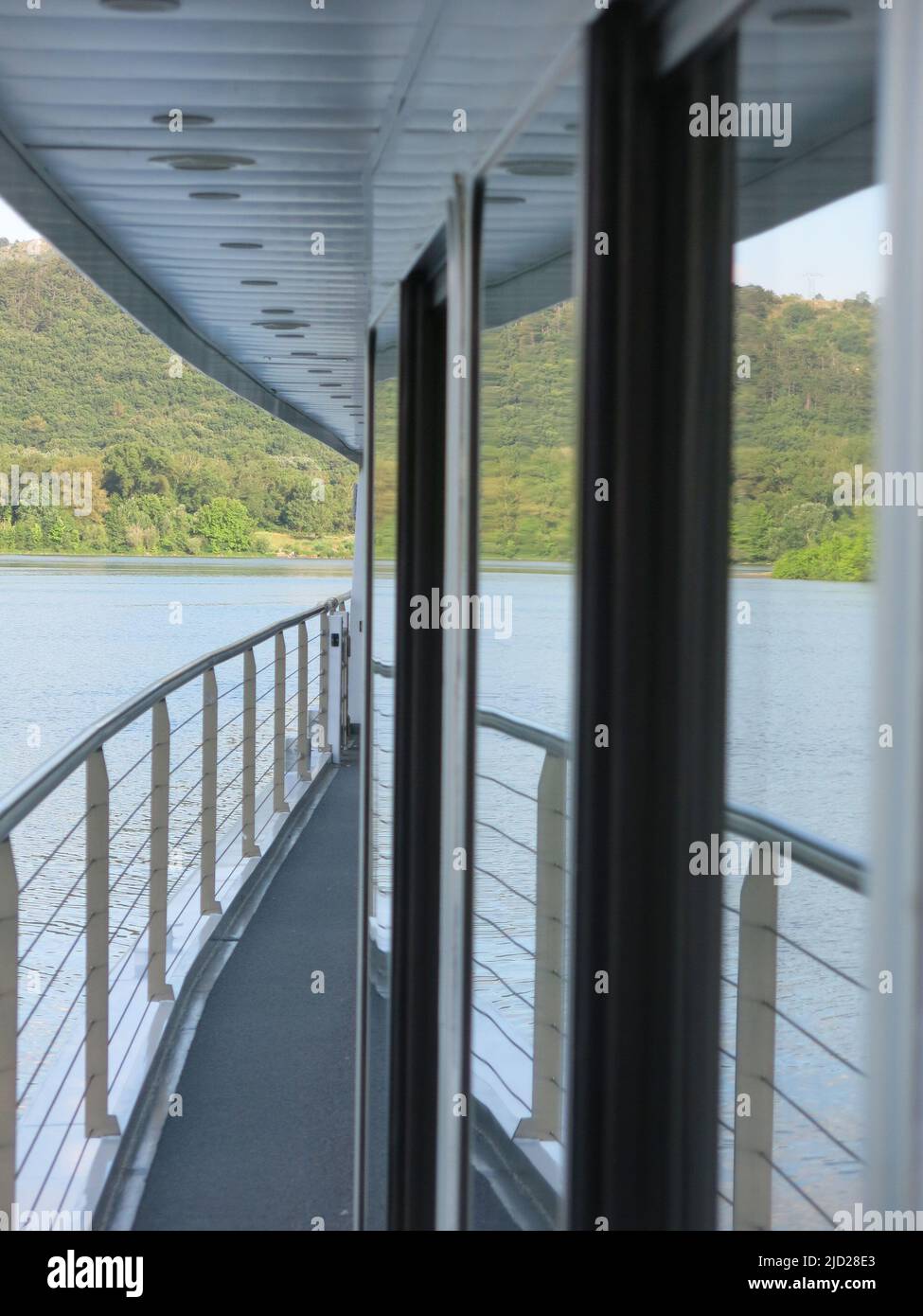 Serenity of the landscape whilst cruising on the Rhone;  river views are reflected in the panoramic windows of the MS Van Gogh's upper deck. Stock Photo
