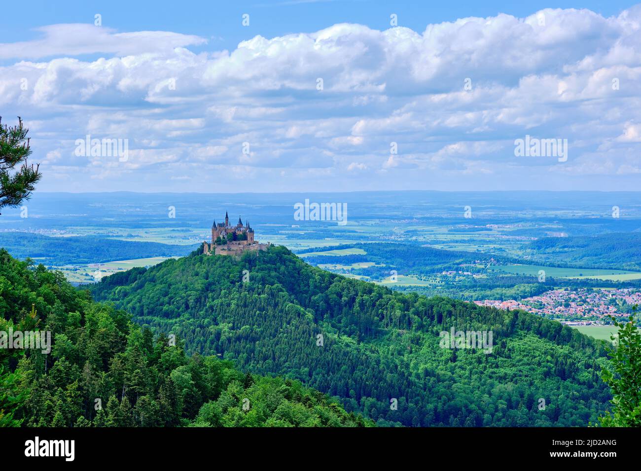 View of Hohenzollern Castle, the ancestral seat of the House of Hohenzollern, from Raichberg on Zollernalb near Albstadt, Baden-Württemberg, Germany. Stock Photo