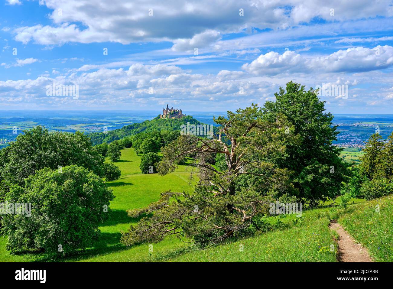 View of Hohenzollern Castle, the ancestral seat of the House of Hohenzollern, from Zeller Horn on Raichberg near Albstadt, Baden-Württemberg, Germany. Stock Photo