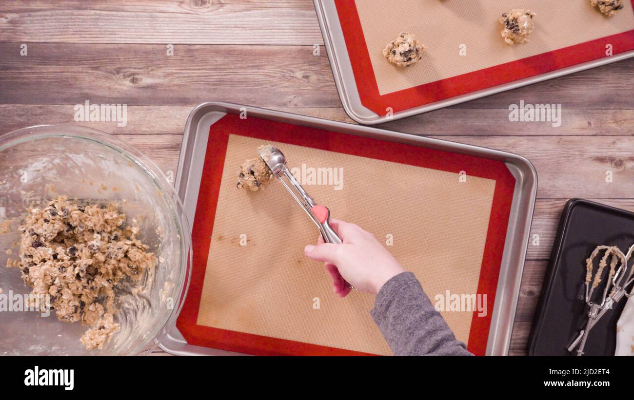 Flat lay. Step by step. Scooping cookie dough with a dough scoop into