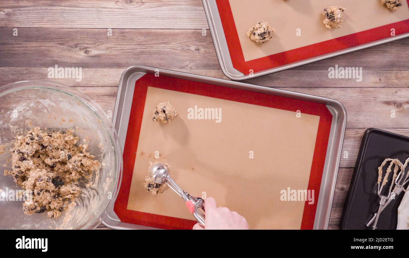 Flat lay. Step by step. Scooping cookie dough with a dough scoop into
