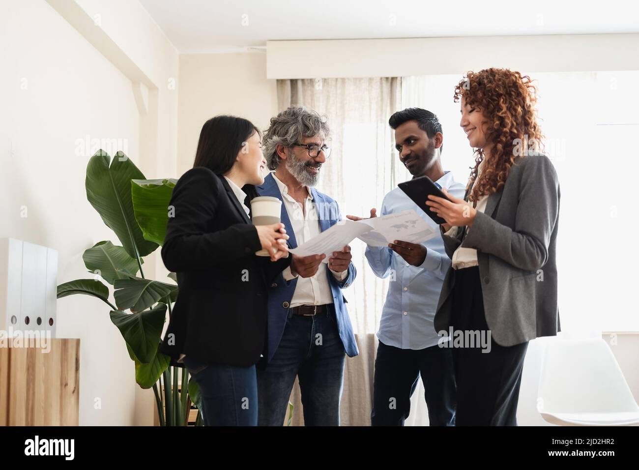 Multiracial business people working together in modern office - Entrepreneurship concept Stock Photo