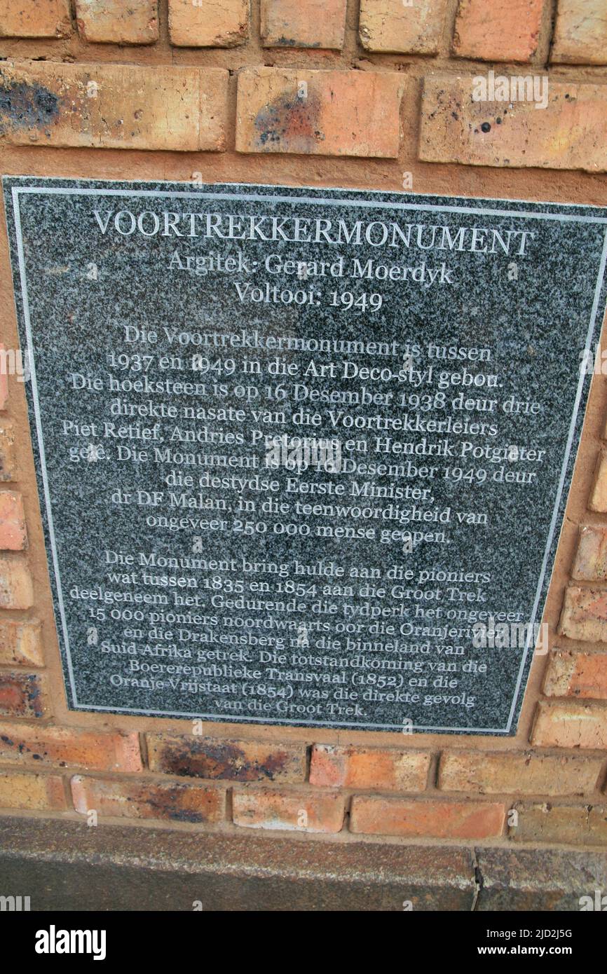 Plaque commemoration in Afrikaans with details of time built and architect of the Voortrekker Monument Museum, Pretoria/Tshwane, Gauteng, South Africa Stock Photo