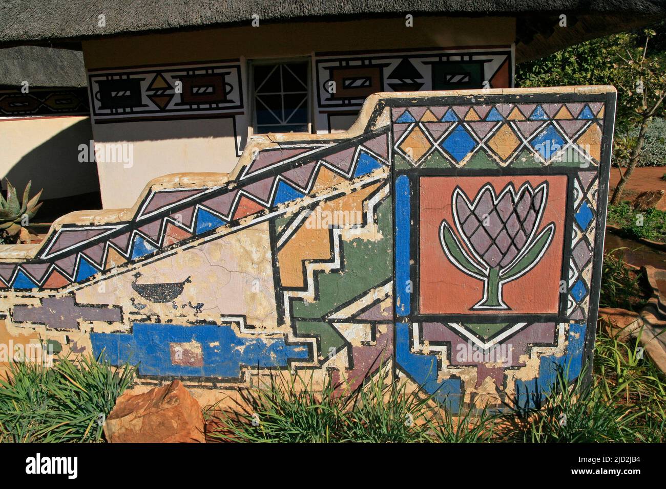 Painting of protea on wall at Ndebele huts, Pretoria National Botanical Garden, Pretoria/Tshwane, Gauteng, South Africa. Stock Photo