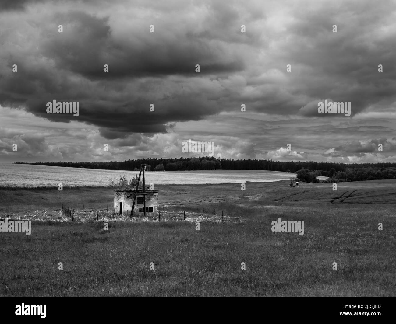 Landscape with an old, abandoned Building near Unesov, Bohemia, Czech Republic in Monochrome Black and White Stock Photo