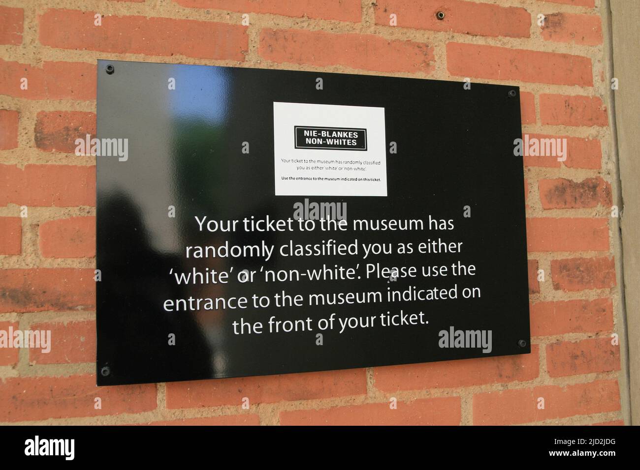 Discriminatory entrance tickets to the Apartheid Museum, Johannesburg, Gauteng, South Africa. Stock Photo
