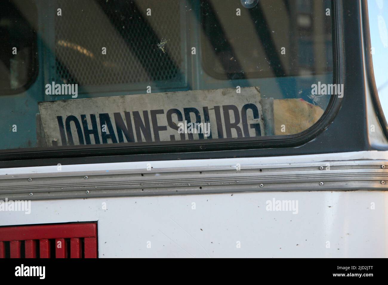Johannesburg sign on bus window, Braamfontein, Johannesburg, Gauteng, South Africa. Stock Photo