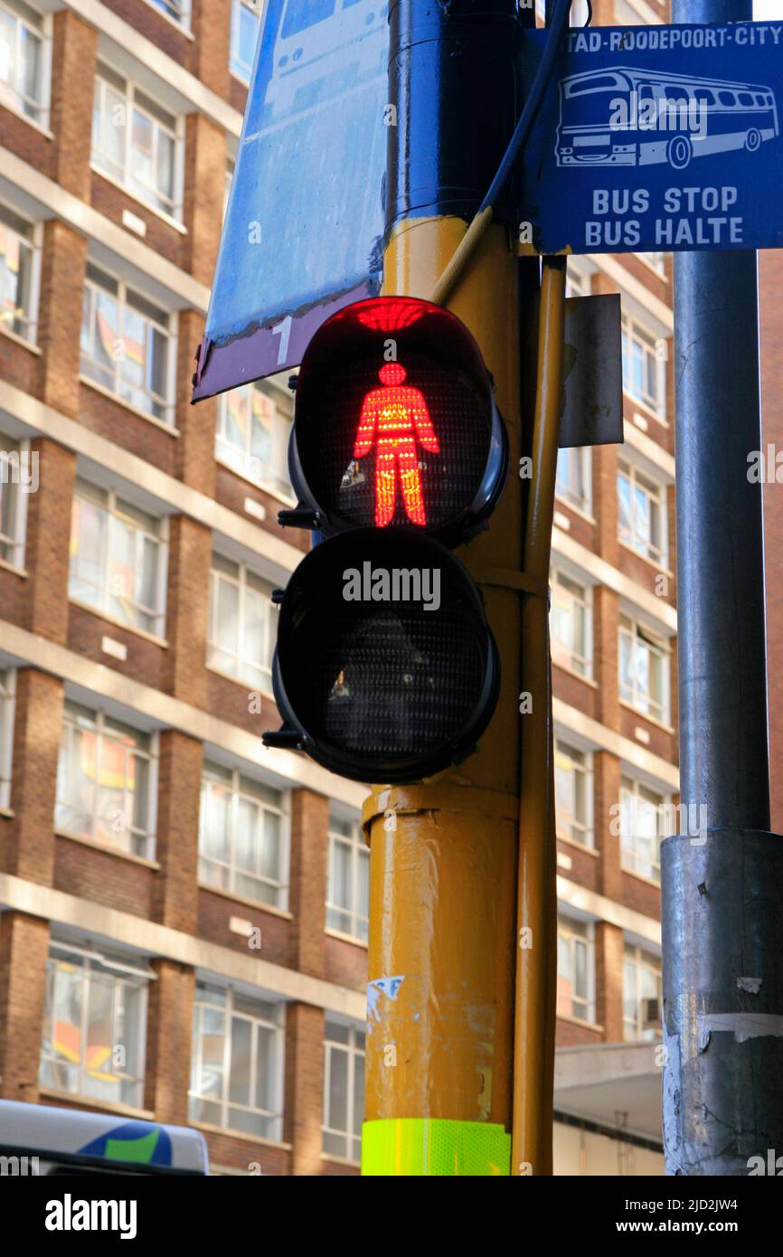 Pedestrian traffic light on red stop light at pedestrian crossing, Braamfontein, Johannesburg, Gauteng, South Africa. Stock Photo