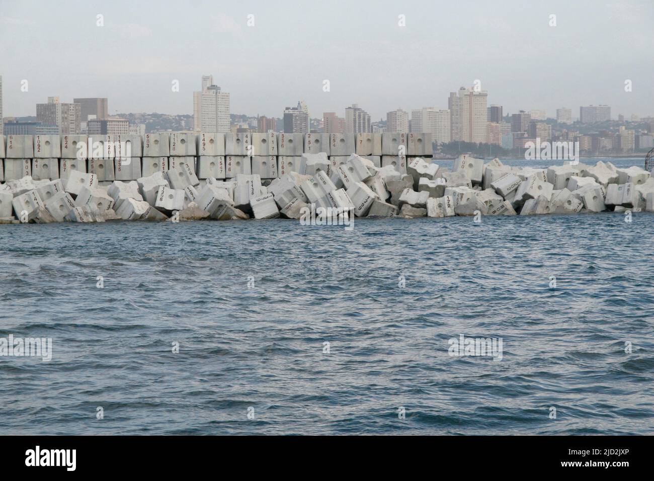 Flood defence wall dolosse at the entrance of Durban Harbour, KwaZulu Natal, South Africa. Stock Photo