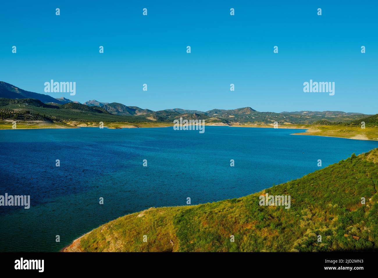 a view over the Iznajar reservoir, in Andalusia, Spain, in a sunny day Stock Photo