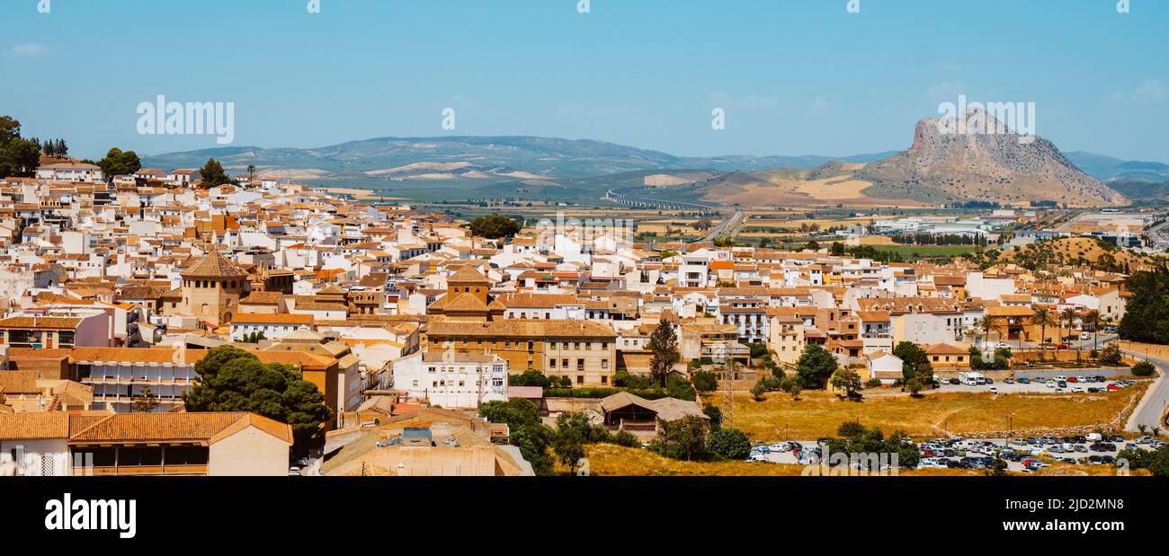 an aerial view of the old town of Antequera, in the province of Malaga, Spain, in a sunny day, in a panoramic format to use as web banner or header Stock Photo
