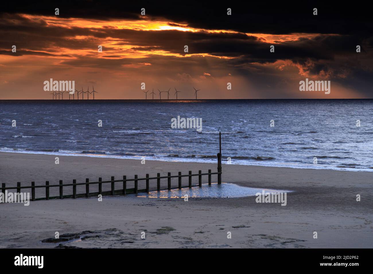 Sunset over Rhyl beach on the North Wales coast Stock Photo Alamy