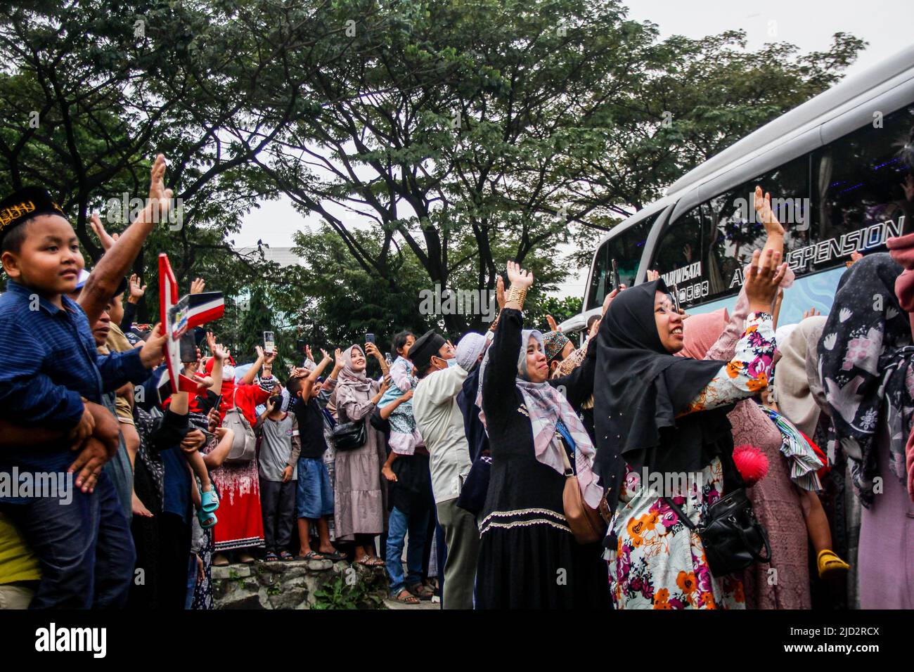 Bandung, Indonesia. 17th June, 2022. Family members seen waving at a