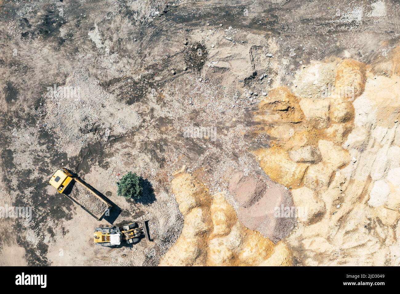 Aerial photo of excavator on industrial place. Construction site top ...