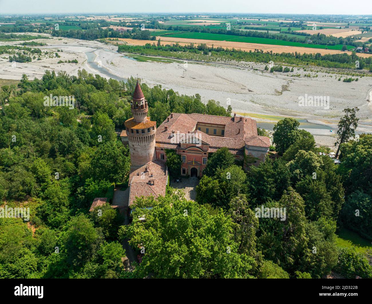 Aerial view of Rivalta castle on the Trebbia river, Piacenza province, Emilia-Romagna, Italy. It is a fortified complex with a cylindrical tower Stock Photo