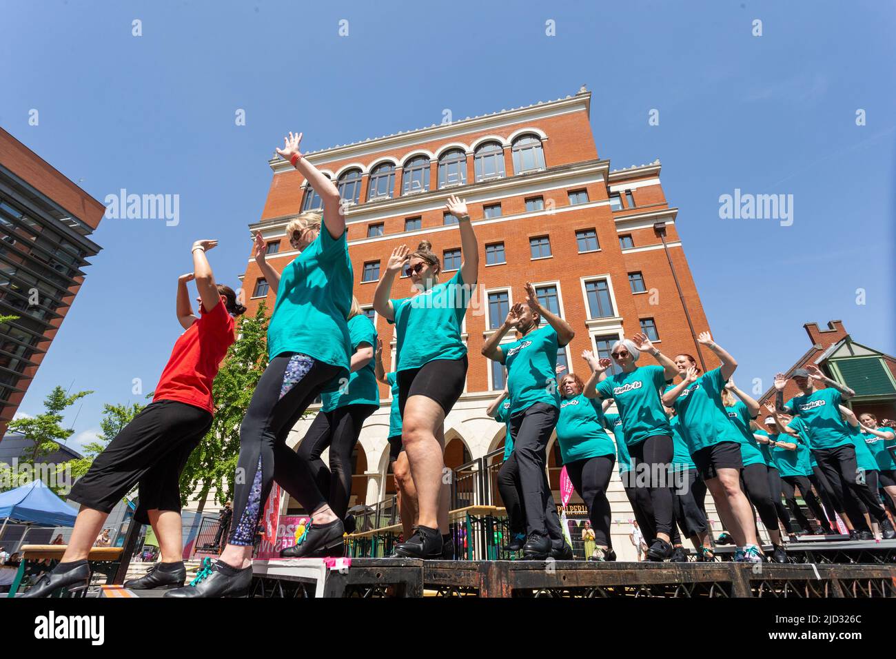 Amateur tap dancers performing in public in a summer dance festival, UK 2022 Stock Photo