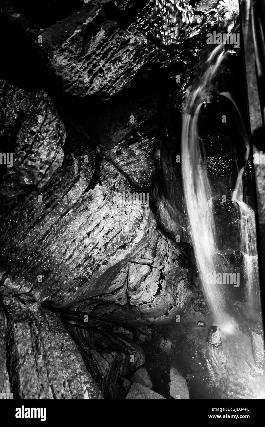 Flowing waterfall underground in Niagara Cave, MN Stock Photo