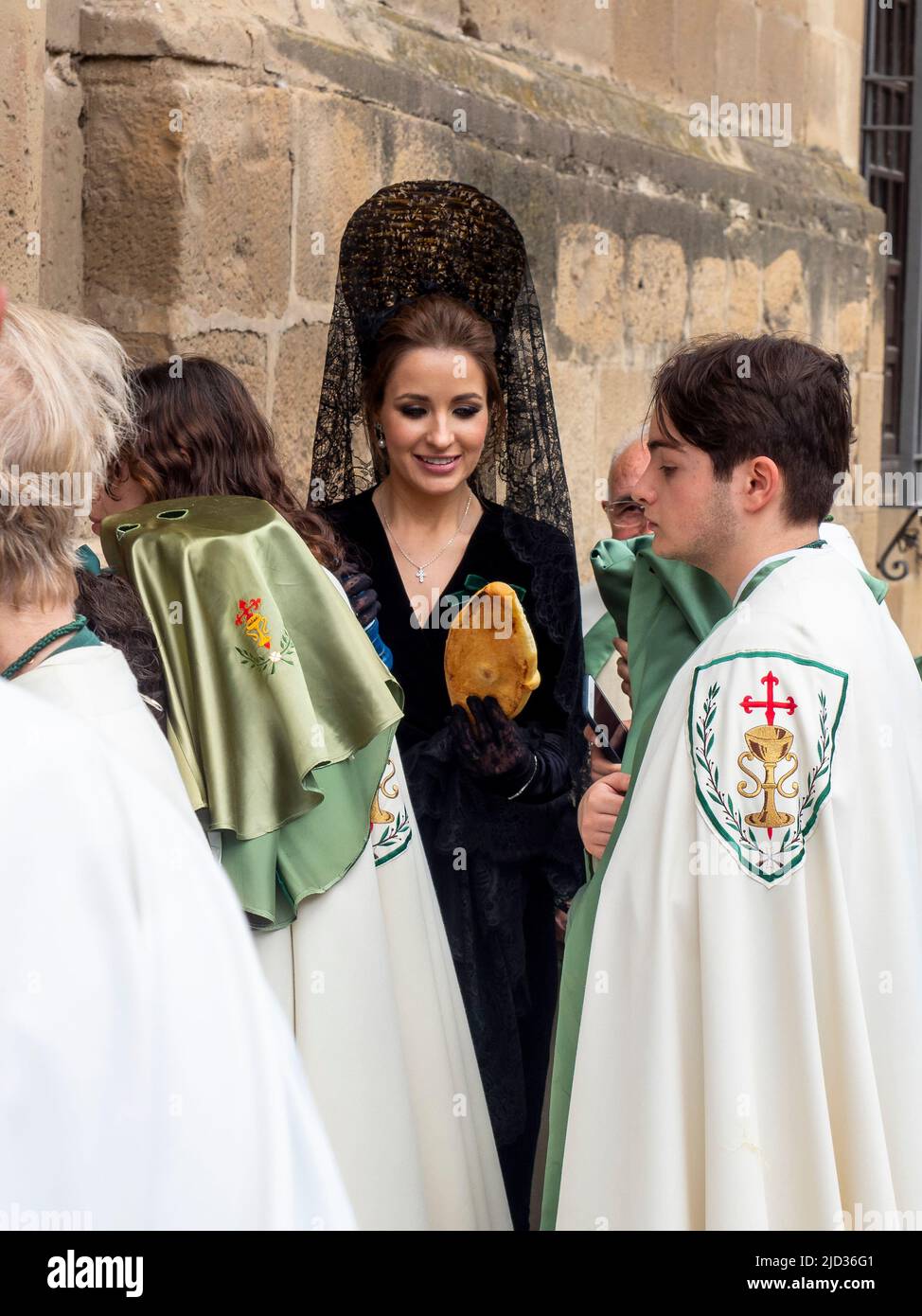 Nazarenes and brotherhoods parading with the thrones of Jesus and the Virgin through the streets of Ubeda during the celebration Stock Photo