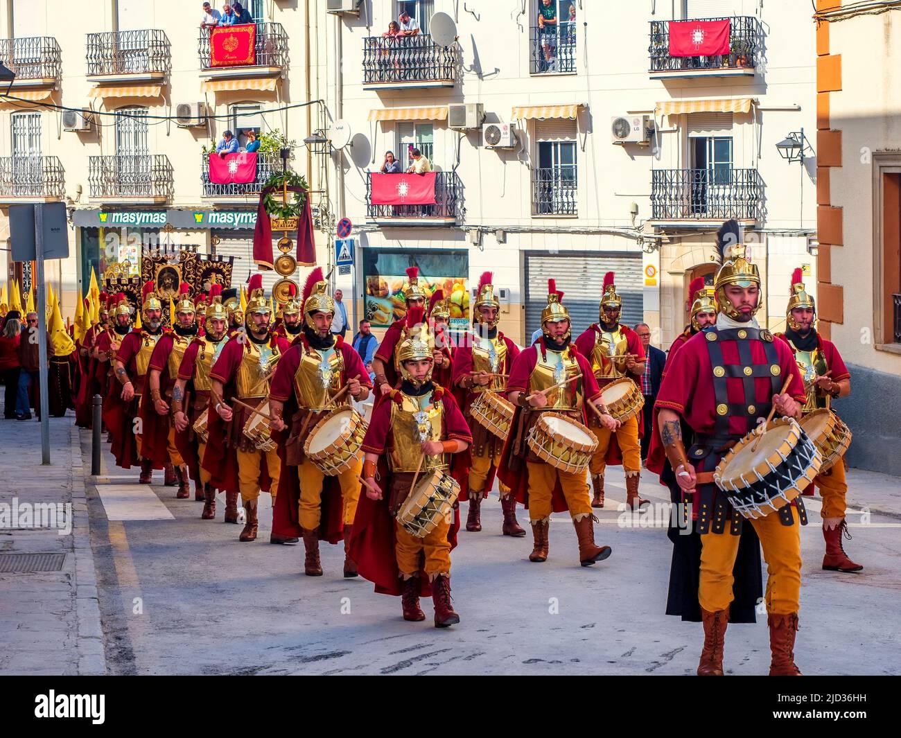 Drum and trumpet band parading through the streets of Ubeda during the celebration of the traditional Semana Santa (Holy Week). Stock Photo