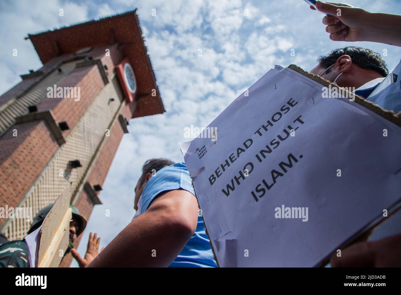 Kashmiri man holds a placard expressing his opinion during a ...