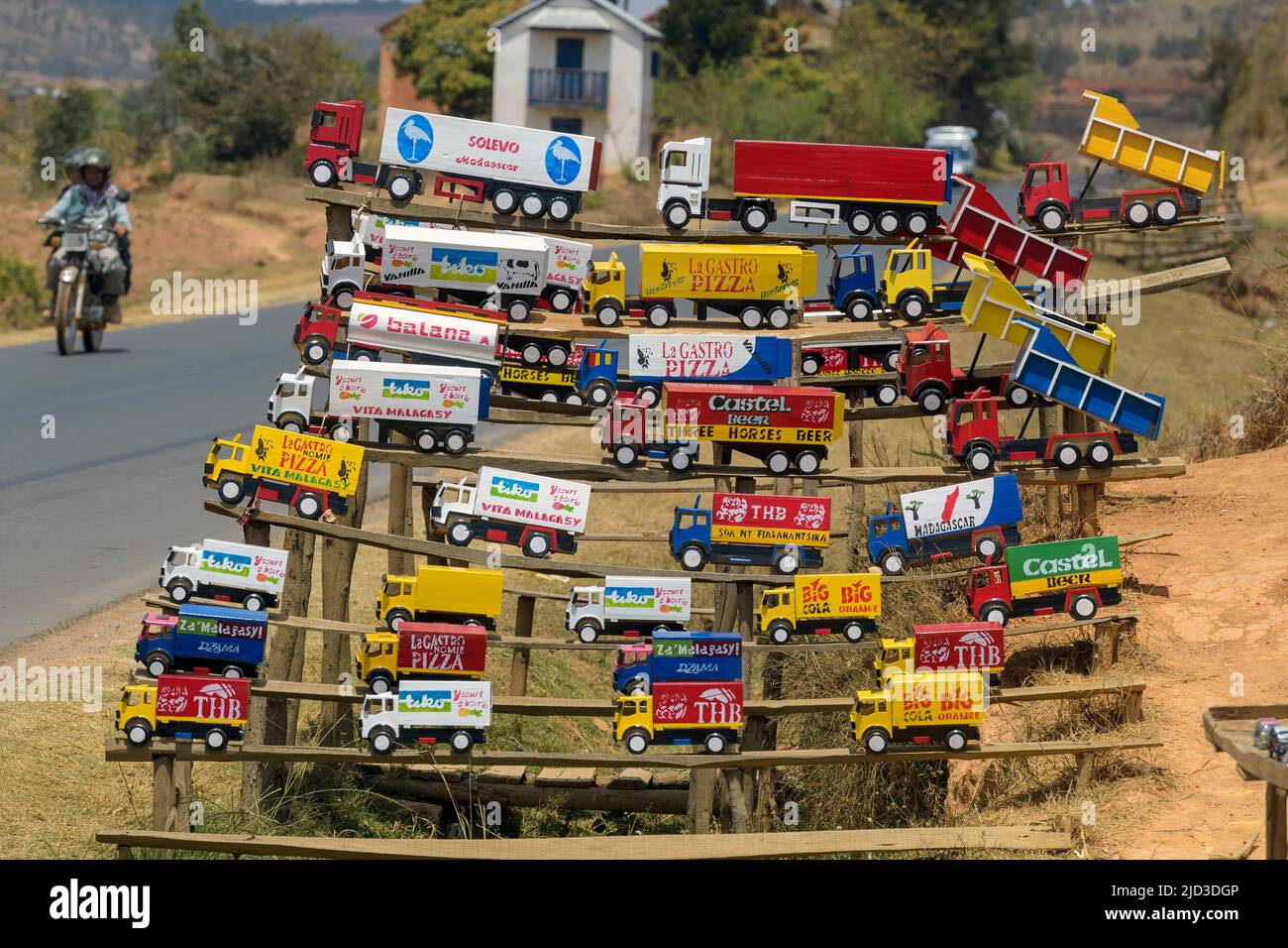 Handmade model cars for sale along the road in eastern Madagascar. Stock Photo