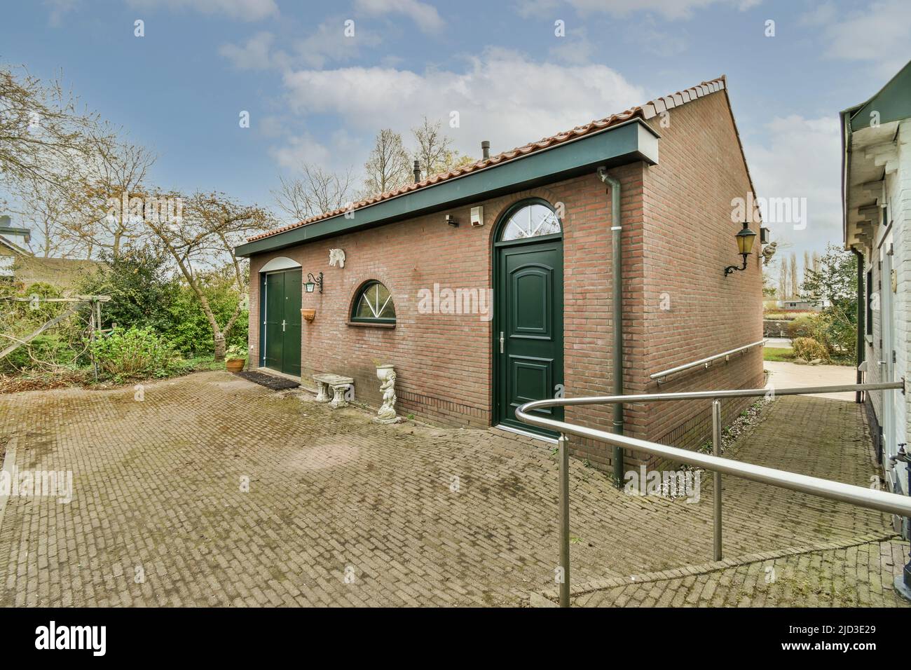Panoramic view of a small brick building in vintage style Stock Photo