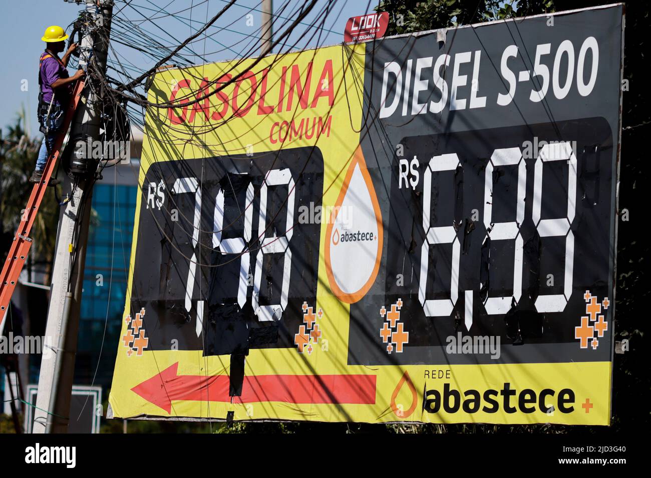 Gasoline and diesel price are displayed near a gas station following the announcement of updated fuel prices at at the Brazilian oil company Petrobras in Brasilia, Brazil June 17, 2022. REUTERS/Ueslei Marcelino Stock Photo