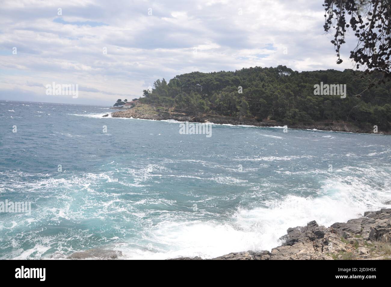 Landscape view of adriatic sea and stormy waves splashing on the coast. Beautiful amazing stunning seascape, waves crashing on rocks during a storm, I Stock Photo