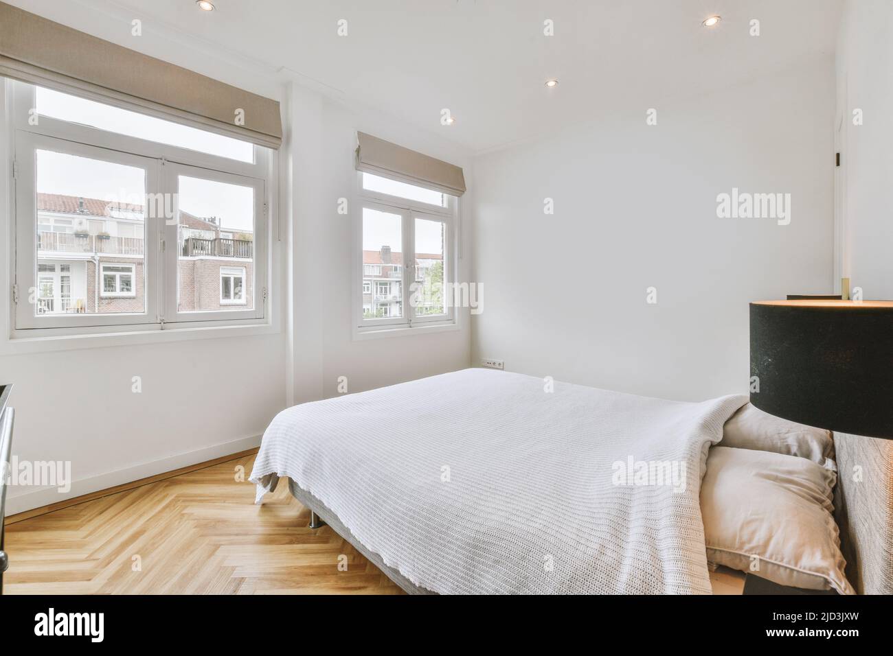 Home interior design of bedroom with bed near window in modern ...
