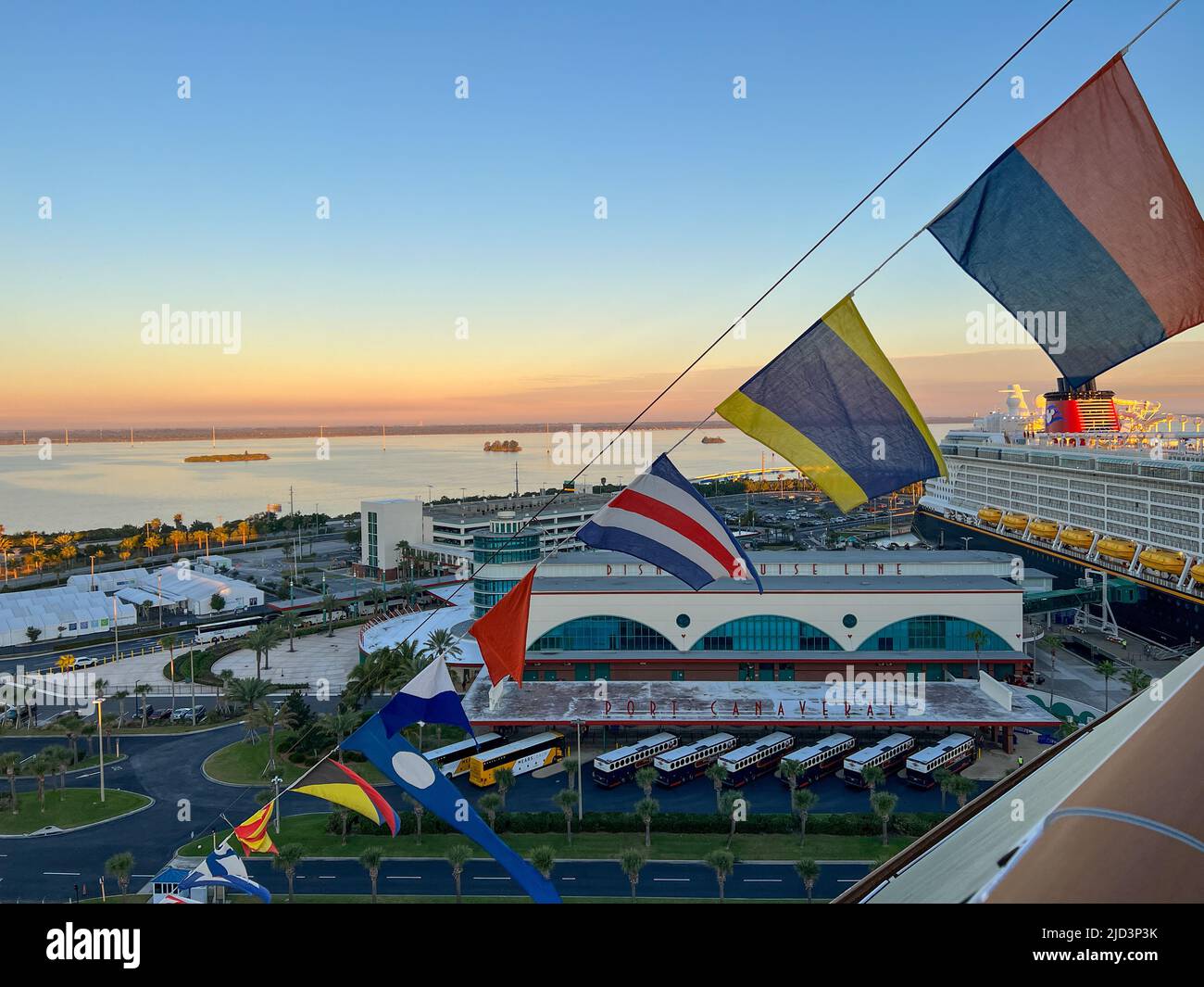 Orlando, FL USA - January 8, 2022: An aerial view of  Port Canaveral in Florida with cruise ship flags waving in the wind. Stock Photo