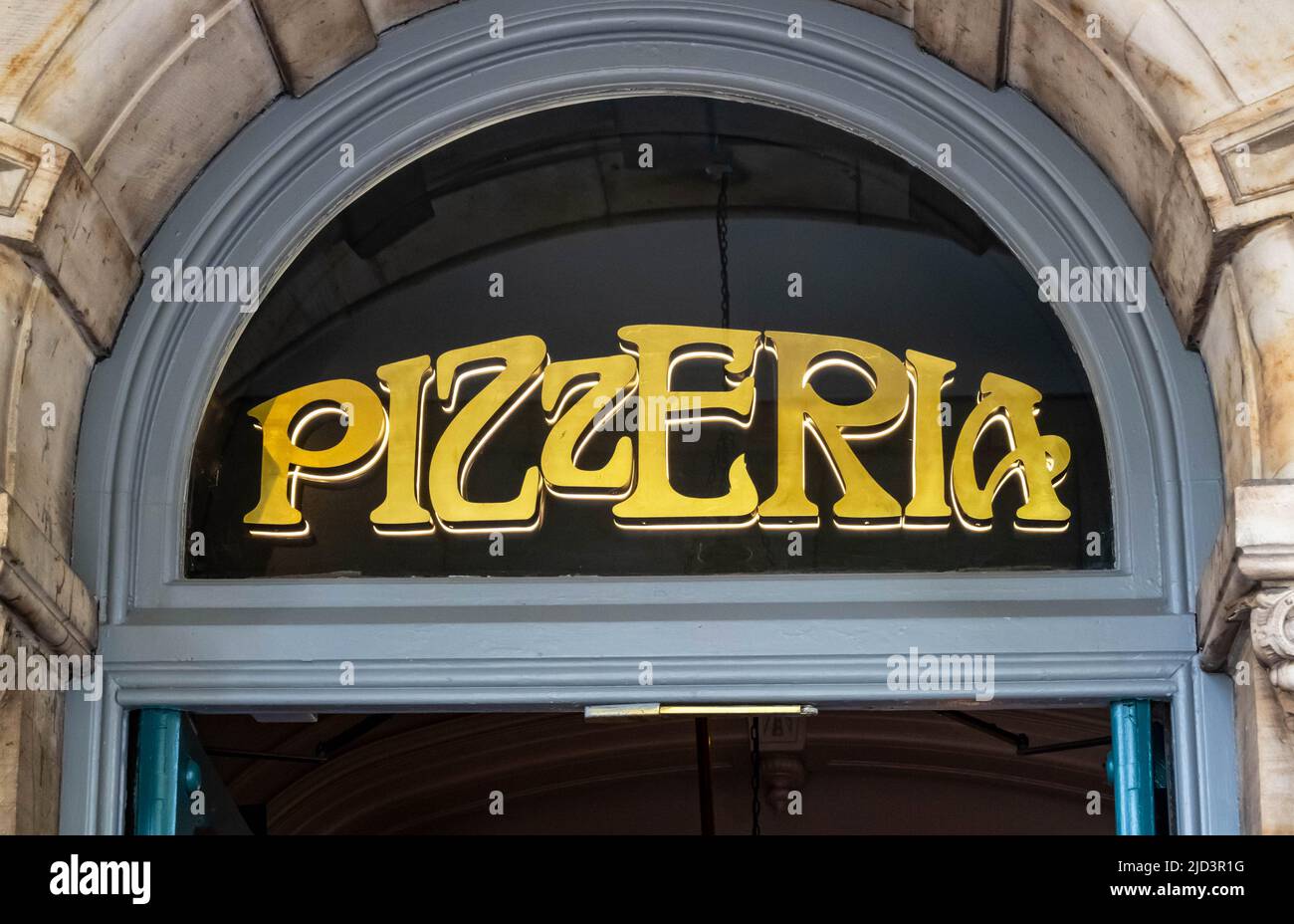 Pizzeria sign in York above the entrance to Pizza Express Stock Photo
