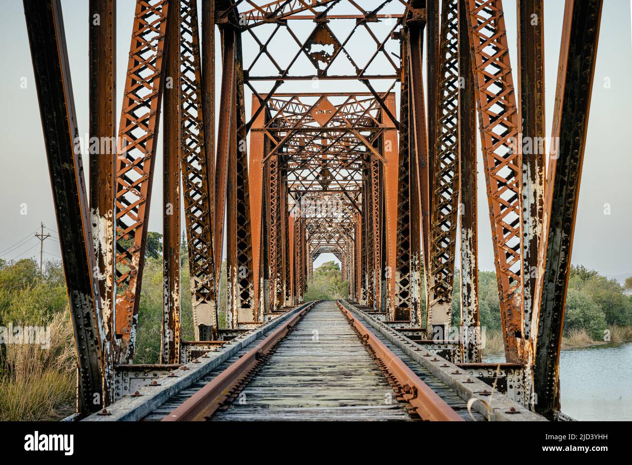 an old railroad bridge going over the salinas river outside of Marina CA Stock Photo