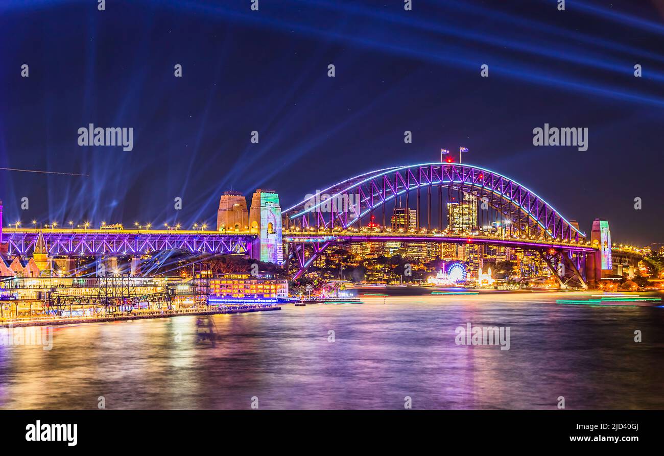 Sydney Harbour bridge with bright colourful lights at Vivid Sydney