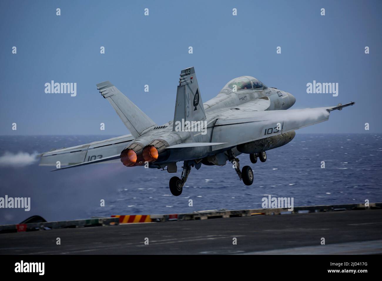 PHILIPPINE SEA (June 15, 2022) An F/A-18F Super Hornet, assigned to the 'Black Aces' of Strike Fighter Squadron (VFA) 41, launches from the flight deck of the Nimitz-class aircraft carrier USS Abraham Lincoln (CVN 72). Abraham Lincoln Strike Group is on a scheduled deployment in the U.S. 7th Fleet area of operations to enhance interoperability through alliances and partnerships while serving as a ready-response force in support of a free and open Indo-Pacific region. (U.S. Navy photo by Mass Communication Specialist 3rd Class Michael Singley) Stock Photo