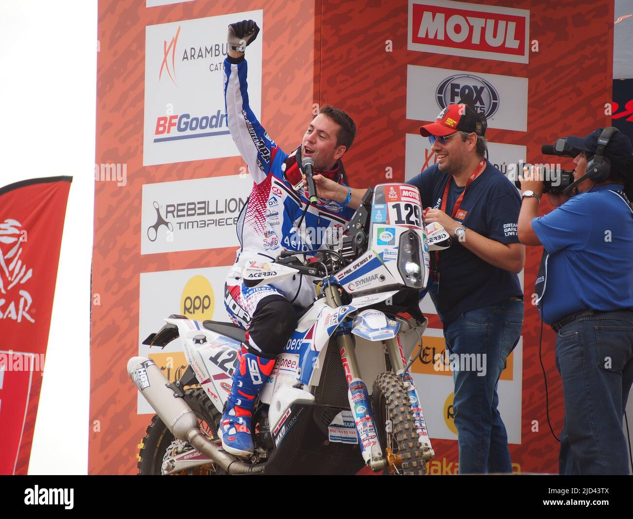 Husqvarna 129, Paul Spierings, from Netherlands, HT Rally Raid Husqvarna Racing Team, on the podium during the starting of the 2019 Dakar Rally, ahead of the rally's Stage 1, Lima-Pisco. The Dakar rally runs this year 100% in Peru. Stock Photo