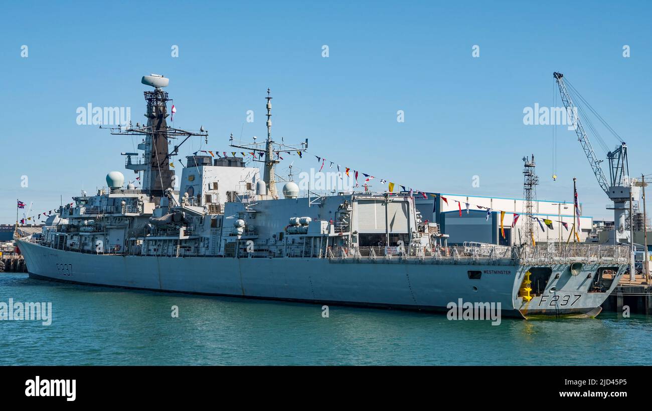 The Royal Navy Type 23 frigate HMS Westminster (F237) dressed overall for the Queen's Platinum Jubilee. Seen alongside at Portsmouth, UK on 2/6/2022. Stock Photo