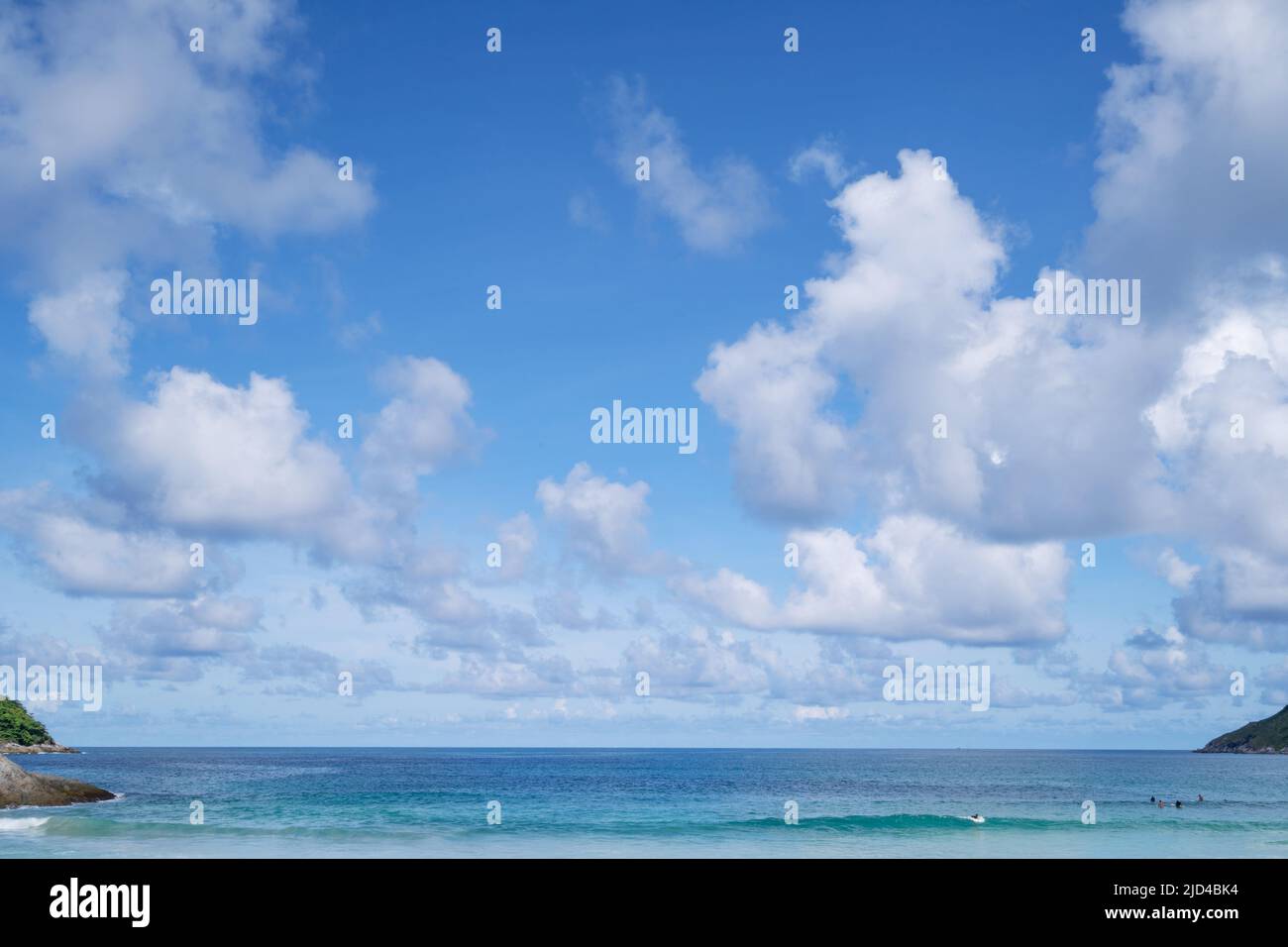 White clouds in blue sky over blue sea water landscape summer greeting ...