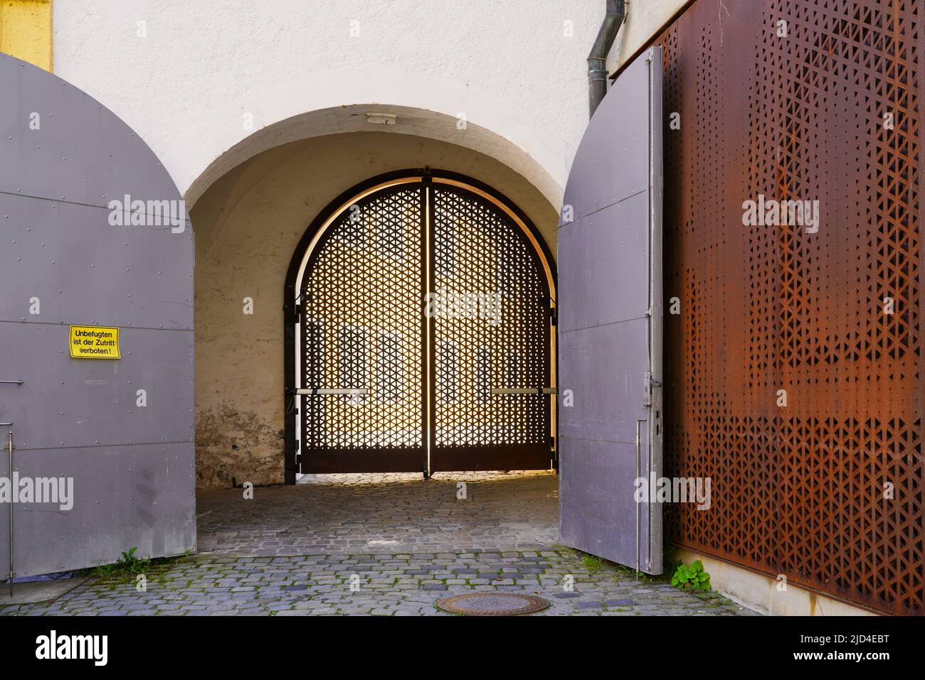 Entrance gate at the former monastery Niedernburg, former Marienkirche in Passau Old Town, Bavaria, Germany, 11.6.22 Stock Photo