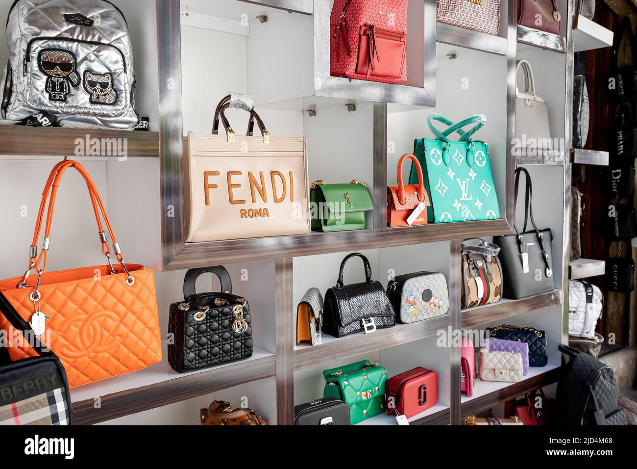 16 May 2022, Antalya, Turkiye: Counterfeit fakes of bags of famous world  brands of fashion accessories for sale at market - Gucci, Yves Saint  Laurent Stock Photo - Alamy