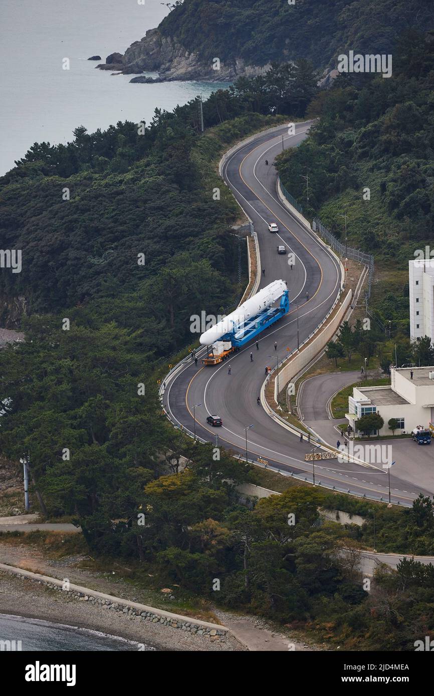 Oct 20,2021-Goheung, South Korea-South Korea's first homegrown space rocket, the Nuri, is transported on a road leading to a launch pad at the Naro Space Center in Goheung, South Jeolla Province, 473 kilometers south of Seoul, on Oct. 20, 2021, one day before the country is expected to launch the rocket, in this photo provided by the state-run Korea Aerospace Research Institute. Stock Photo