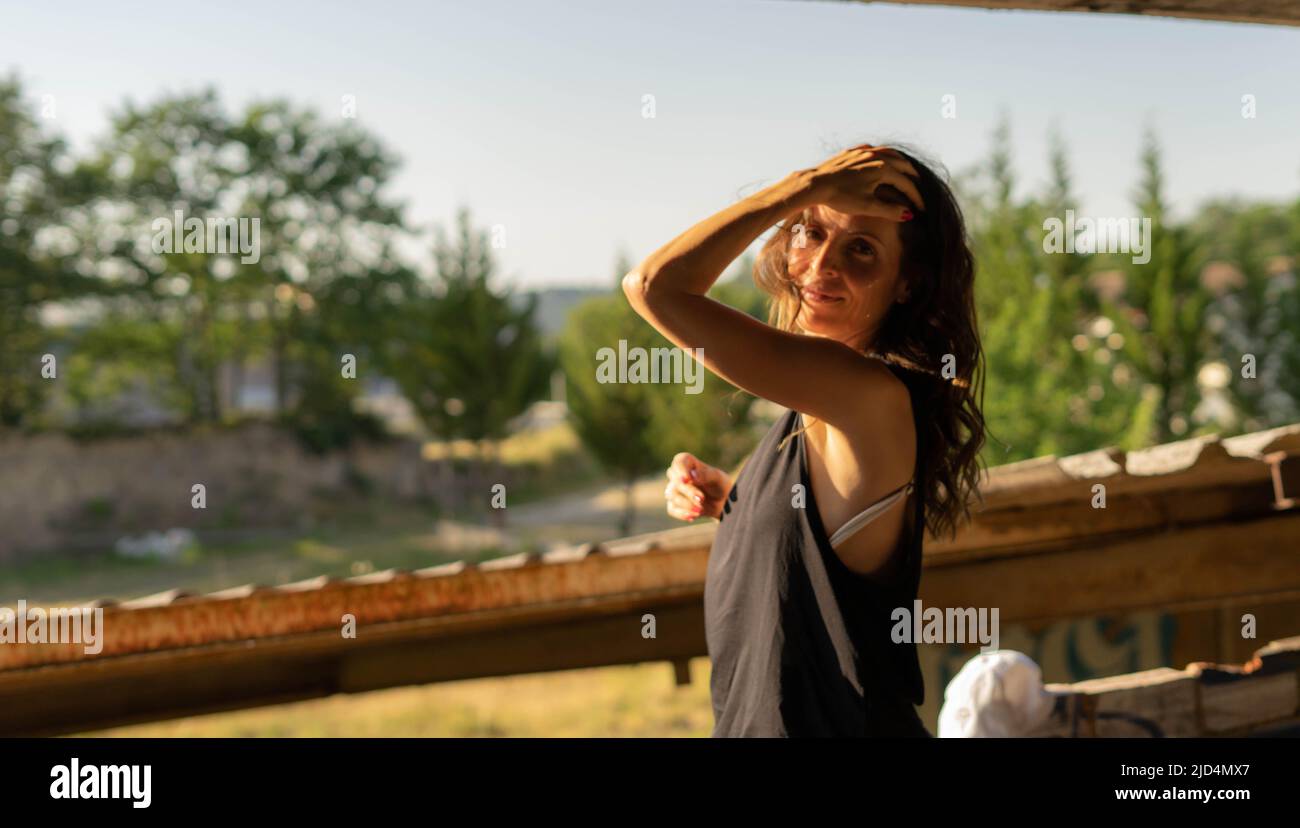 woman touching her head Stock Photo - Alamy
