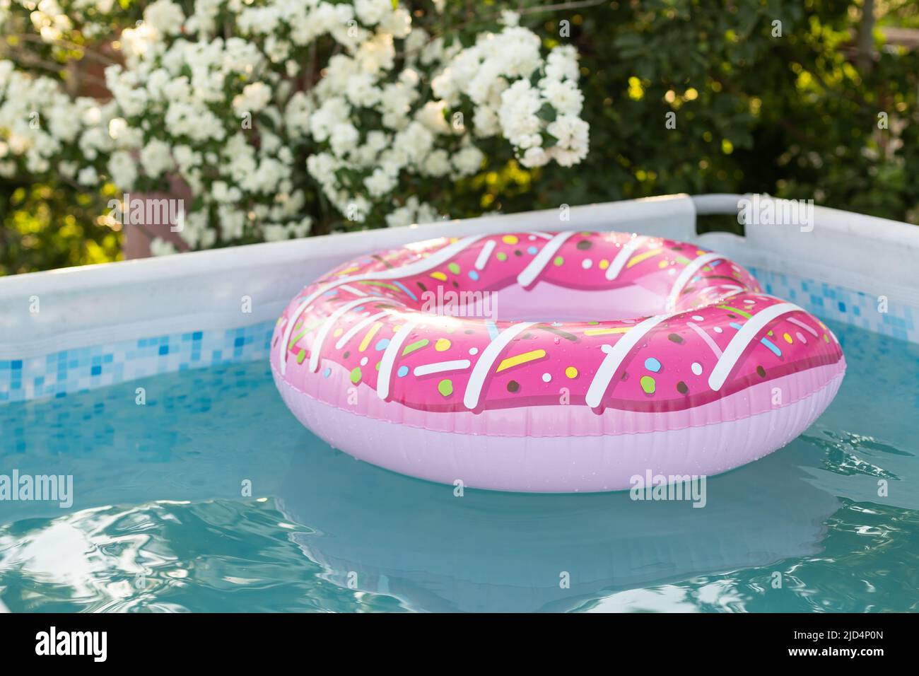 Blue beach ball pool ring hi-res stock photography and images - Alamy