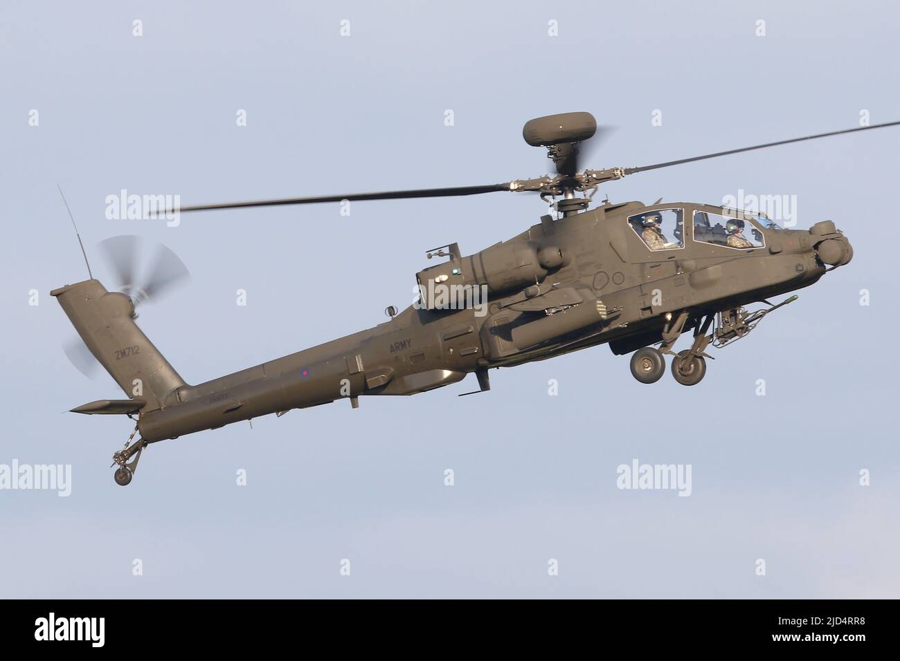 New Boeing built AH-64E Apache attack helicopter landing at Wattisham airfield. Stock Photo