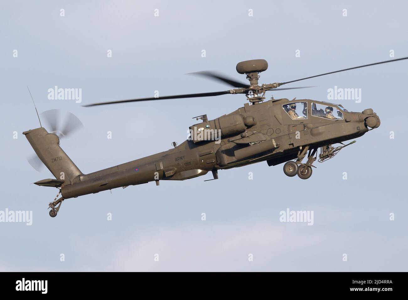 New Boeing built AH-64E Apache attack helicopter landing at Wattisham airfield. Stock Photo