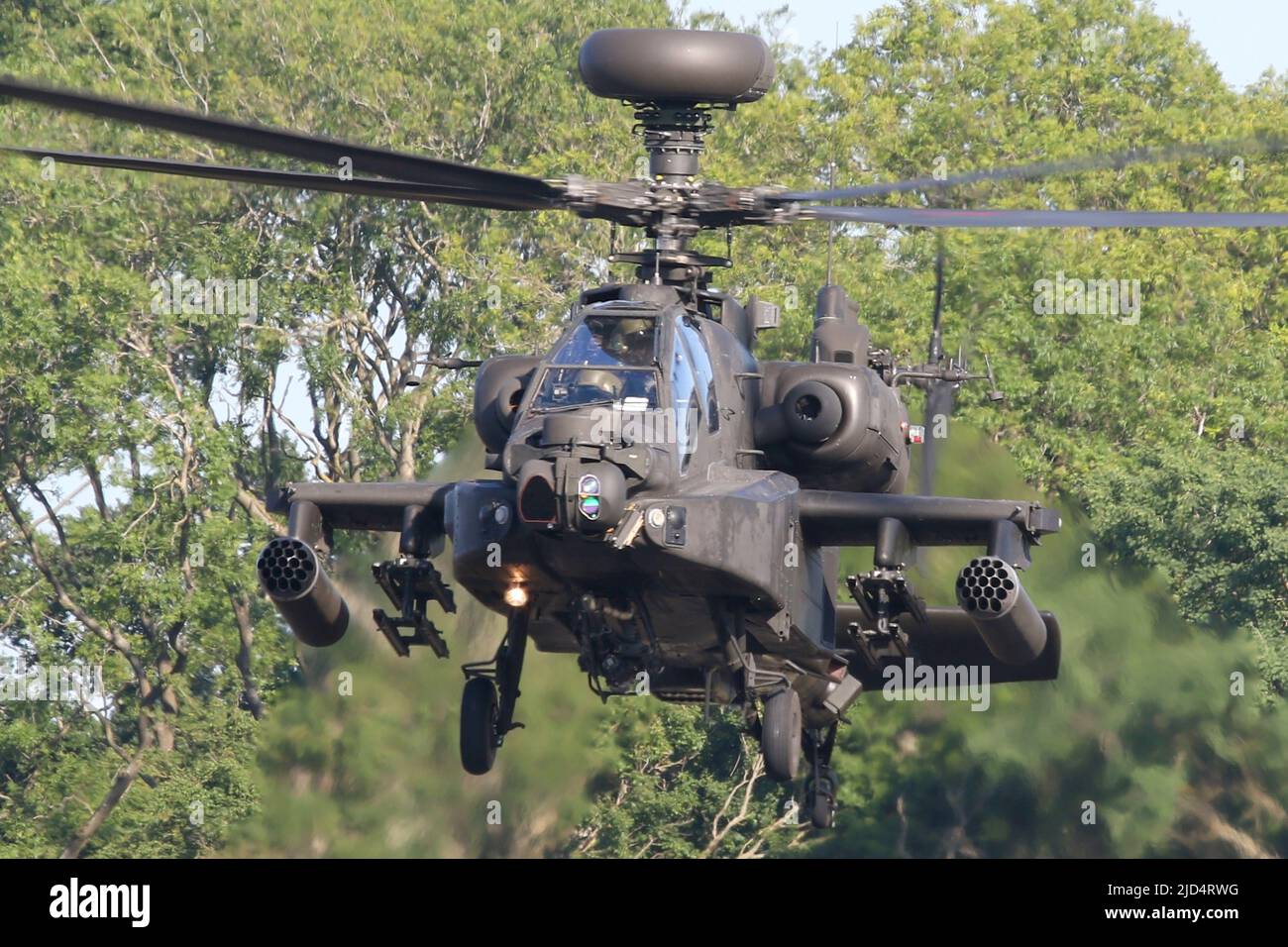 Army Air Corps Apache AH1 over the Wattisham runway during a evening flight. Stock Photo