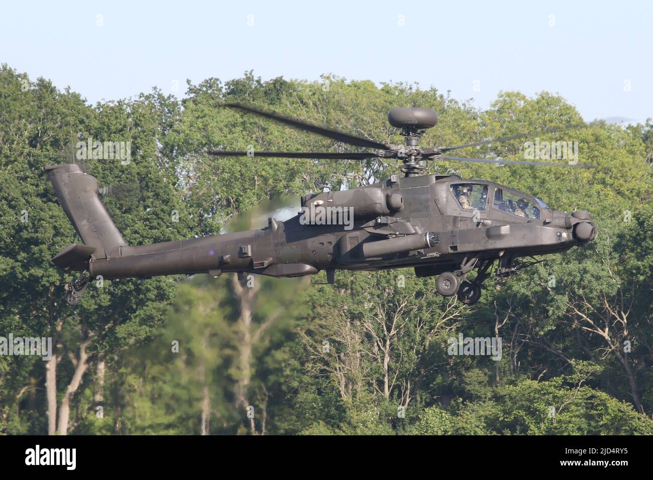 Army Air Corps Apache AH1 over the Wattisham runway during a evening flight. Stock Photo