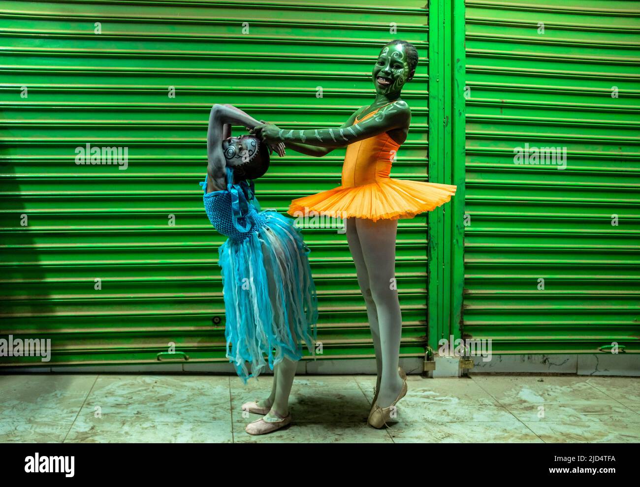 Anyango Pheny Anyango and Marion Anyango from Kibera Slums show off their ...